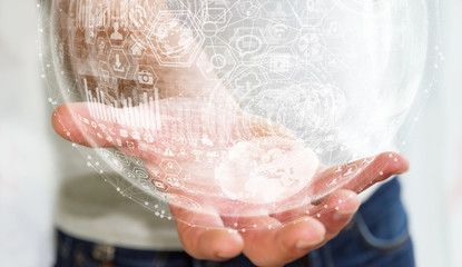 Businessman using digital tactile world interface with his hand