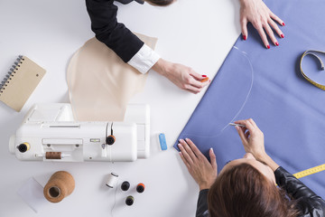 Fototapeta premium Two girls making a pattern