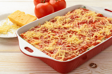 Lasagna with spinach, ricotta and feta. Cooking process.