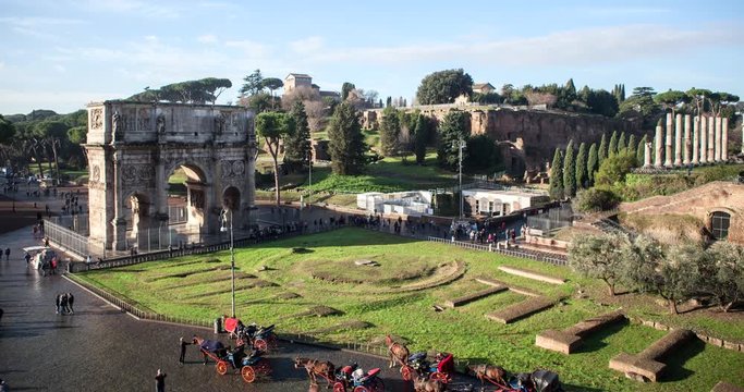 Rome, Italy - View of the Arch of Constantine from the Colosseum on a sunny morning - Timelapse without motion 