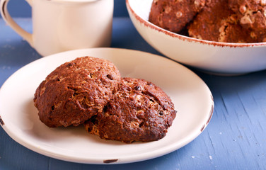 Fototapeta na wymiar Double chocolate coconut cookies on plate