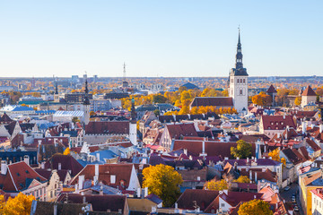 St. John Church, Town Hall, Niguliste church. Towers and red roofs of old capital, Estonia. Aerial view, autumn season