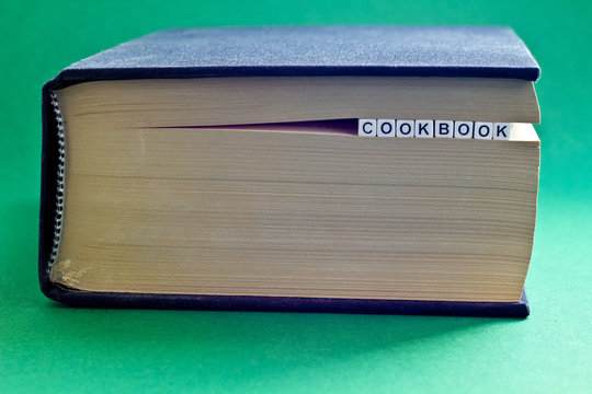 It is book with word cookbook. This is theme of education.