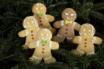 Group of funny Gingerbread boys and  girls on christmas tree