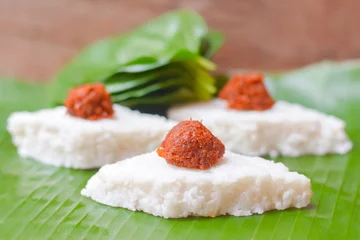 Küchenrückwand glas motiv Kiribath, The milk rice is a traditional Sri Lankan food made from rice and coconut milk which is used to be a main food on any cultural ceremony or occasion © Saman Weeratunga