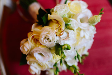 wedding bouquet and rings