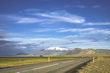 Isolated road to Snaefellsjoekull mountain at Iceland, summer ti