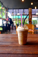 Iced coffee on a table in the coffee shop.