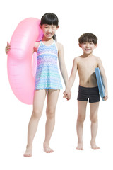 Fototapeta premium Cute children in swimsuit with swim ring