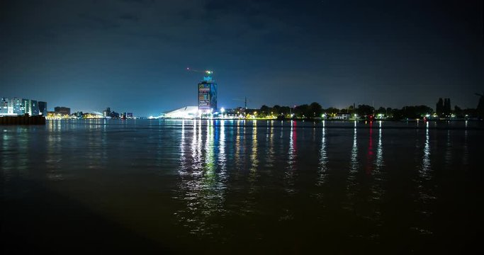 Amsterdam, Netherlands - ships in the harbor and port area of Amsterdam with Eye en IJ - Timelapse without zoom - September 2014