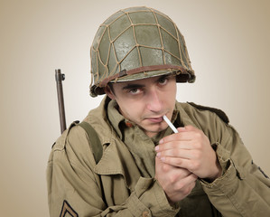young American soldier smoke cigarette, world war two