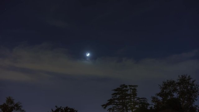 4K timelapse video of beautiful moon set with clouds at Los Angeles, California