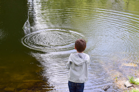 Little boy near the water