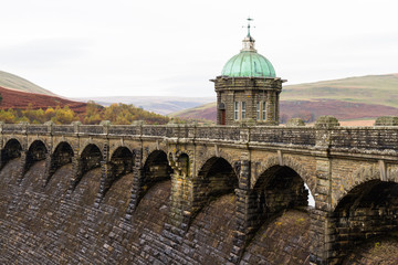 Obraz premium The Craig Goch reservoir and dam intake tower.