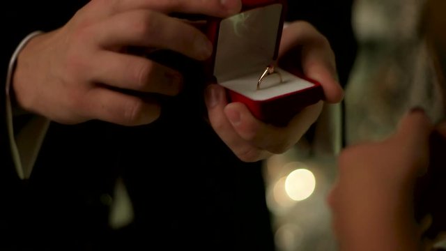 Close up of proposal made on a day of New Year. Be my wife, happy moment.