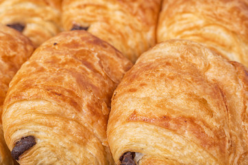 Close up macro shot of a bunch of French chocolatines