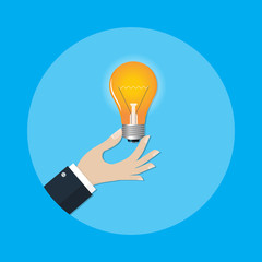 businessman holding incandescent light bulb , representing ideas and innovation. Innovative idea concept for business.