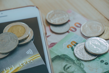 Credit card,  plastic money, put on smartphone.