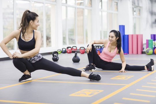 Young women exercising at gym