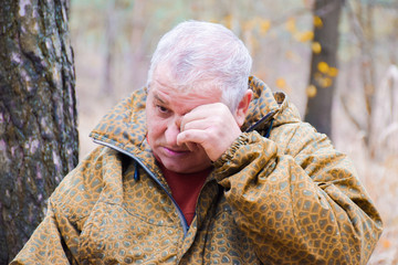 Mature caucasian man crying