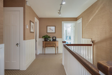 Beautiful hallway with natural fiber wallpaper.