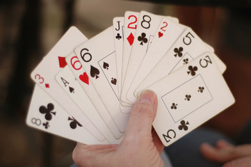 Hand with Vintage Playing Cards