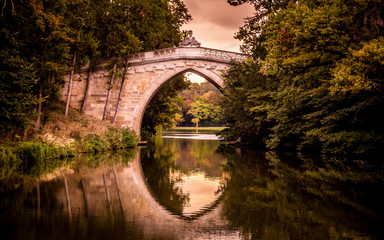 Bridge above the lake, sunset time