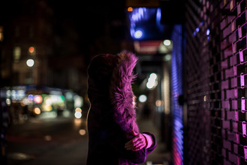 Girl looking into mystery lights