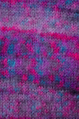 Handknitted fabric of colored mohair yarn