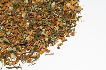 Loose leaf apple tea on white background.