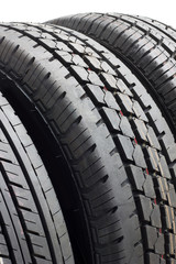 Car tires background in a row on white background. rubber