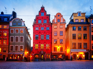 Obraz premium Gamla Stan ols square houses facades at night, Stockholm, Sweden, toned