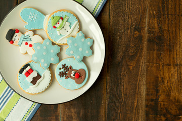 Obraz na płótnie Canvas Delicious Christmas cookies in blue