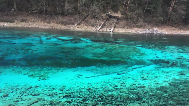 Colorful lake at Jiuzhaigou National Park  lake,  The UNESCO World Heritage in Sichuan , China in  Autumn  in November  located in  in  Tibetan-Qiang of Sichuan ,China
