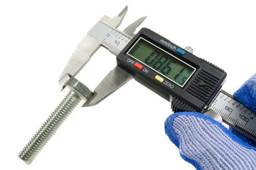Measurement of the bolt diameter with a digital caliper on the white background