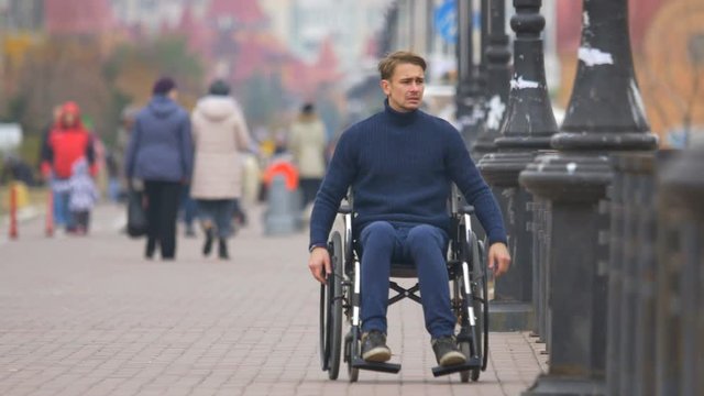The angry disabled ride the wheelchair. Real time capture