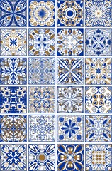 Mega set of traditional spanish or portuguese ceramic and pottery ornamental tiles in indigo and golden design.