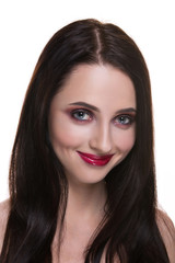 Naklejka premium Beautiful young brunette woman with perfect skin closeup portrait isolated on white background. Wavy hairstyle. Bright luxury make-up. Red lips.