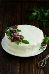 New Year or Christmas cake with raspberries, selective focus.