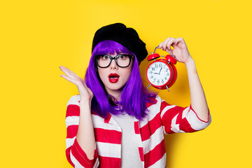 Woman with alarm clock