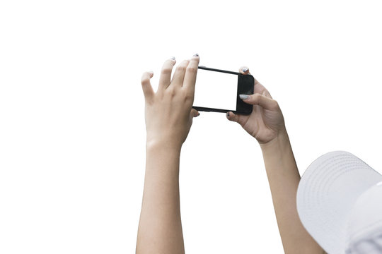 Hand of a woman taking a picture with a smart phone isolated on white background.