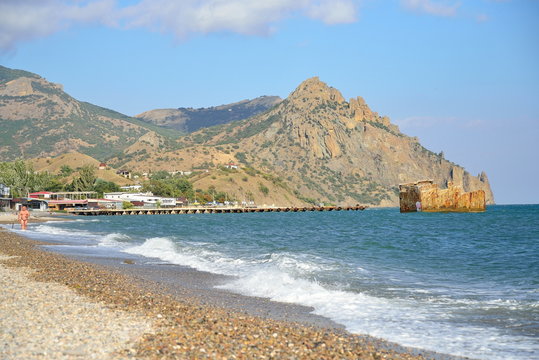 The beach in the Resort village with views of the Karadag