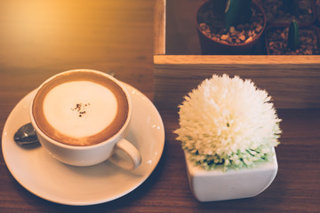 Coffee cup in coffee shop - vintage style