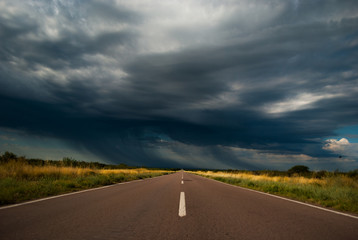 Road and cloudy sky