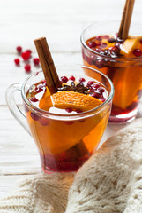 Cup of hot tea with fruit and spices.