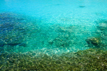 Naklejka na ściany i meble Crystal clear sea water at Racha Island, Phuket, Thailand.