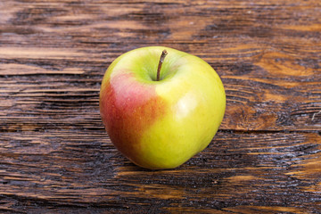 apple on a wooden table