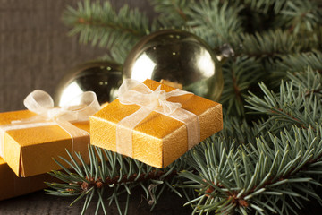 Luxury New Year gifts, different present boxes under Christmas tree in holiday eve, Christmastime celebration, home decorated with festive shiny balls, magic night