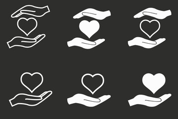 Heart in hand icon set.