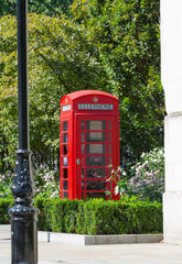 Obraz premium British red iconic phone box next to St. Paul's cathedral